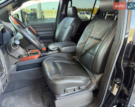 Чорний Інфініті QX56, об'ємом двигуна 5.55 л та пробігом 170 тис. км за 8500 $, фото 10 на Automoto.ua
