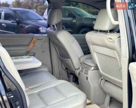 Черный Инфинити QX56, объемом двигателя 5.6 л и пробегом 235 тыс. км за 9499 $, фото 8 на Automoto.ua
