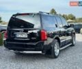 Черный Инфинити QX56, объемом двигателя 5.6 л и пробегом 235 тыс. км за 9499 $, фото 1 на Automoto.ua
