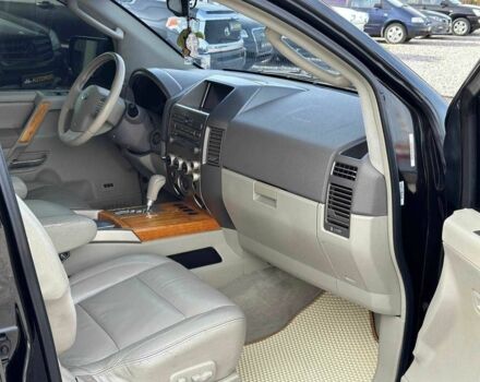 Черный Инфинити QX56, объемом двигателя 5.6 л и пробегом 235 тыс. км за 9499 $, фото 5 на Automoto.ua