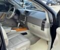 Черный Инфинити QX56, объемом двигателя 5.6 л и пробегом 235 тыс. км за 9499 $, фото 5 на Automoto.ua