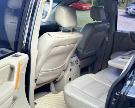 Черный Инфинити QX56, объемом двигателя 5.6 л и пробегом 235 тыс. км за 9499 $, фото 6 на Automoto.ua
