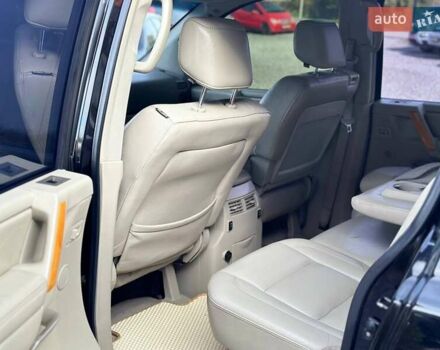 Чорний Інфініті QX56, об'ємом двигуна 5.6 л та пробігом 235 тис. км за 8800 $, фото 6 на Automoto.ua