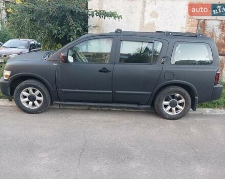 Черный Инфинити QX56, объемом двигателя 5.6 л и пробегом 140 тыс. км за 9500 $, фото 1 на Automoto.ua