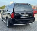 Черный Инфинити QX56, объемом двигателя 5.6 л и пробегом 235 тыс. км за 9499 $, фото 3 на Automoto.ua