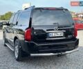 Черный Инфинити QX56, объемом двигателя 5.6 л и пробегом 235 тыс. км за 9499 $, фото 3 на Automoto.ua