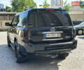 Черный Инфинити QX56, объемом двигателя 5.6 л и пробегом 280 тыс. км за 6900 $, фото 4 на Automoto.ua