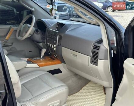 Черный Инфинити QX56, объемом двигателя 5.6 л и пробегом 235 тыс. км за 9499 $, фото 5 на Automoto.ua