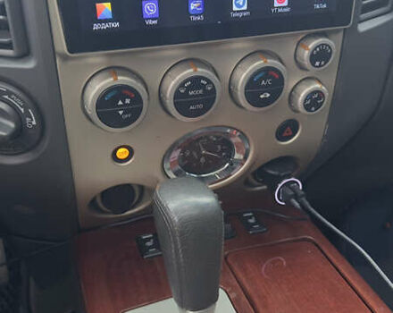 Чорний Інфініті QX56, об'ємом двигуна 5.6 л та пробігом 320 тис. км за 12500 $, фото 12 на Automoto.ua