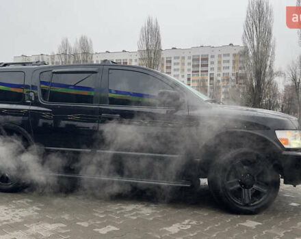 Чорний Інфініті QX56, об'ємом двигуна 5.6 л та пробігом 320 тис. км за 12500 $, фото 9 на Automoto.ua