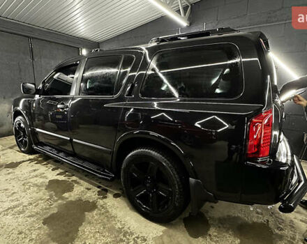 Чорний Інфініті QX56, об'ємом двигуна 5.6 л та пробігом 320 тис. км за 12500 $, фото 1 на Automoto.ua