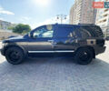 Черный Инфинити QX56, объемом двигателя 5.6 л и пробегом 280 тыс. км за 6900 $, фото 3 на Automoto.ua