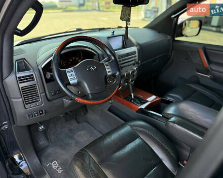 Чорний Інфініті QX56, об'ємом двигуна 5.55 л та пробігом 170 тис. км за 8500 $, фото 4 на Automoto.ua