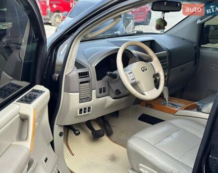 Черный Инфинити QX56, объемом двигателя 5.6 л и пробегом 235 тыс. км за 9499 $, фото 4 на Automoto.ua