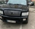 Чорний Інфініті QX56, об'ємом двигуна 0.56 л та пробігом 228 тис. км за 9500 $, фото 1 на Automoto.ua