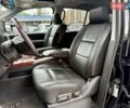 Черный Инфинити QX56, объемом двигателя 5.6 л и пробегом 108 тыс. км за 10500 $, фото 1 на Automoto.ua