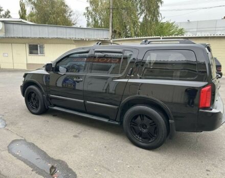 Чорний Інфініті QX56, об'ємом двигуна 5.6 л та пробігом 158 тис. км за 8499 $, фото 5 на Automoto.ua