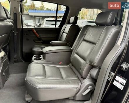 Черный Инфинити QX56, объемом двигателя 5.6 л и пробегом 108 тыс. км за 10500 $, фото 1 на Automoto.ua