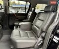 Черный Инфинити QX56, объемом двигателя 5.6 л и пробегом 108 тыс. км за 10500 $, фото 1 на Automoto.ua