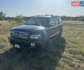 Черный Инфинити QX56, объемом двигателя 5.55 л и пробегом 200 тыс. км за 12000 $, фото 2 на Automoto.ua