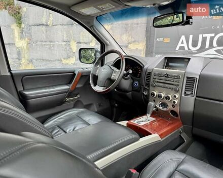 Черный Инфинити QX56, объемом двигателя 5.6 л и пробегом 108 тыс. км за 10500 $, фото 4 на Automoto.ua