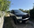 Черный Инфинити QX56, объемом двигателя 5.6 л и пробегом 158 тыс. км за 8000 $, фото 6 на Automoto.ua
