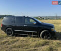 Черный Инфинити QX56, объемом двигателя 5.55 л и пробегом 200 тыс. км за 12000 $, фото 1 на Automoto.ua