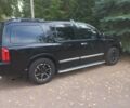 Чорний Інфініті QX56, об'ємом двигуна 5 л та пробігом 233 тис. км за 12000 $, фото 2 на Automoto.ua