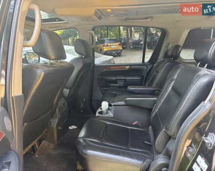 Черный Инфинити QX56, объемом двигателя 5.55 л и пробегом 450 тыс. км за 8000 $, фото 4 на Automoto.ua