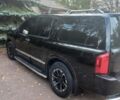Чорний Інфініті QX56, об'ємом двигуна 5 л та пробігом 233 тис. км за 12000 $, фото 3 на Automoto.ua