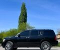 Черный Инфинити QX56, объемом двигателя 5.6 л и пробегом 283 тыс. км за 12000 $, фото 1 на Automoto.ua