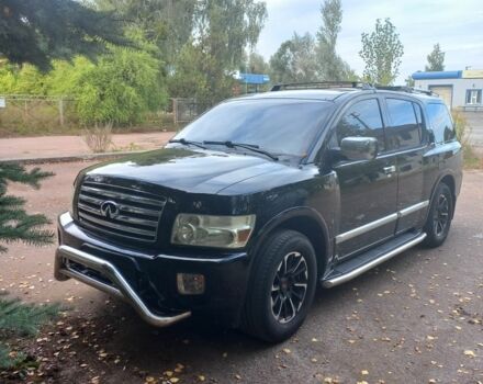 Чорний Інфініті QX56, об'ємом двигуна 5 л та пробігом 233 тис. км за 12000 $, фото 1 на Automoto.ua