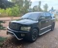 Чорний Інфініті QX56, об'ємом двигуна 5 л та пробігом 233 тис. км за 12000 $, фото 1 на Automoto.ua