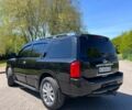 Черный Инфинити QX56, объемом двигателя 5.6 л и пробегом 283 тыс. км за 12000 $, фото 2 на Automoto.ua