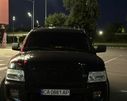 Черный Инфинити QX56, объемом двигателя 5.6 л и пробегом 240 тыс. км за 12500 $, фото 7 на Automoto.ua