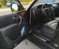 Черный Инфинити QX56, объемом двигателя 5.55 л и пробегом 141 тыс. км за 19100 $, фото 5 на Automoto.ua