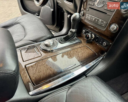 Черный Инфинити QX56, объемом двигателя 5.6 л и пробегом 220 тыс. км за 21500 $, фото 82 на Automoto.ua