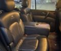 Чорний Інфініті QX56, об'ємом двигуна 5.6 л та пробігом 267 тис. км за 15000 $, фото 6 на Automoto.ua