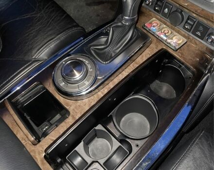 Чорний Інфініті QX56, об'ємом двигуна 5.6 л та пробігом 267 тис. км за 15000 $, фото 10 на Automoto.ua