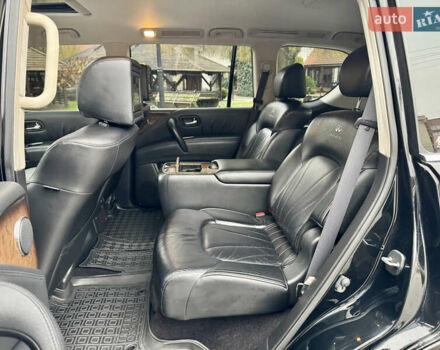 Черный Инфинити QX56, объемом двигателя 5.6 л и пробегом 220 тыс. км за 21500 $, фото 61 на Automoto.ua