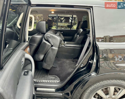 Черный Инфинити QX56, объемом двигателя 5.6 л и пробегом 220 тыс. км за 21500 $, фото 71 на Automoto.ua