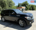 Черный Инфинити QX56, объемом двигателя 5.55 л и пробегом 255 тыс. км за 19000 $, фото 1 на Automoto.ua