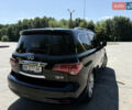 Черный Инфинити QX56, объемом двигателя 5.55 л и пробегом 255 тыс. км за 19000 $, фото 4 на Automoto.ua