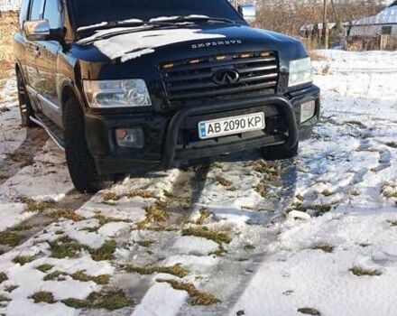 Черный Инфинити QX56, объемом двигателя 5.6 л и пробегом 280 тыс. км за 10000 $, фото 1 на Automoto.ua
