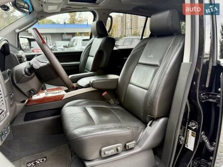 Черный Инфинити QX56, объемом двигателя 5.6 л и пробегом 108 тыс. км за 10500 $, фото 1 на Automoto.ua