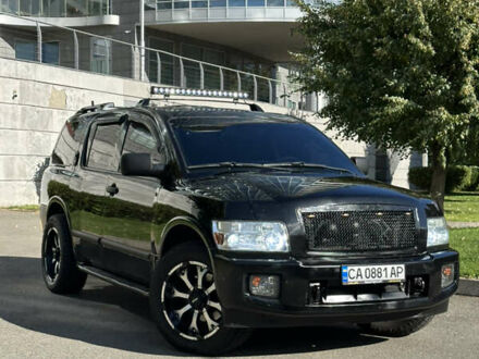Чорний Інфініті QX56, об'ємом двигуна 5.6 л та пробігом 250 тис. км за 9890 $, фото 1 на Automoto.ua