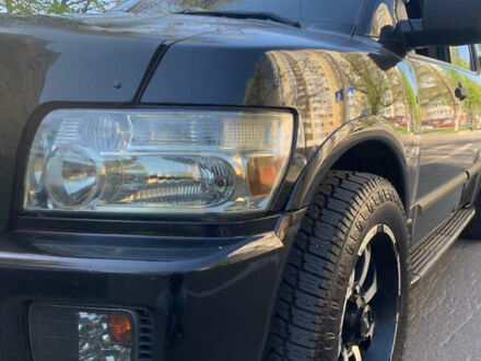 Чорний Інфініті QX56, об'ємом двигуна 5.55 л та пробігом 179 тис. км за 17200 $, фото 1 на Automoto.ua