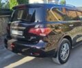 Коричневый Инфинити QX56, объемом двигателя 5.55 л и пробегом 265 тыс. км за 25000 $, фото 5 на Automoto.ua