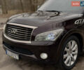 Червоний Інфініті QX56, об'ємом двигуна 5.6 л та пробігом 214 тис. км за 18800 $, фото 11 на Automoto.ua