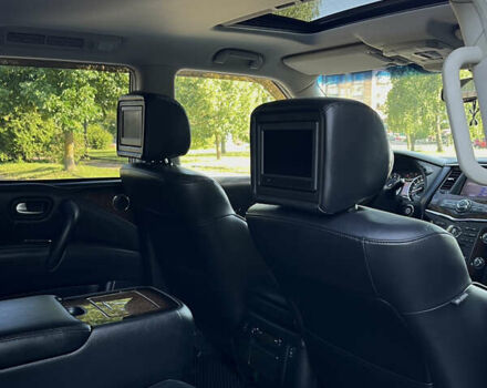 Красный Инфинити QX56, объемом двигателя 5.55 л и пробегом 213 тыс. км за 18800 $, фото 4 на Automoto.ua